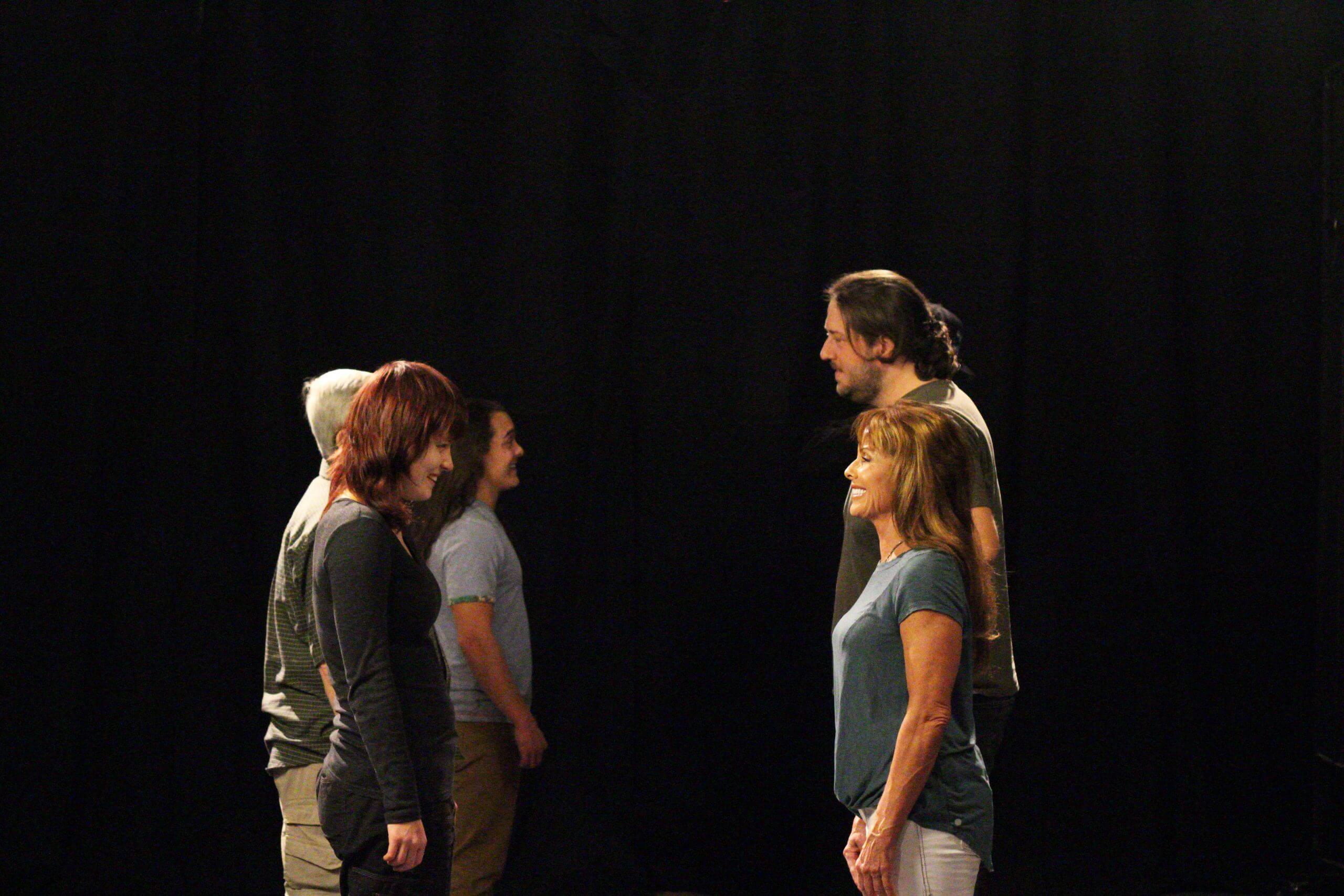 A group of actors doing an exercise during an acting class